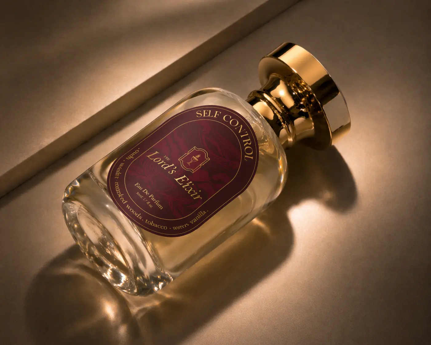 Glass perfume bottle labeled with aroma brand lying on surface